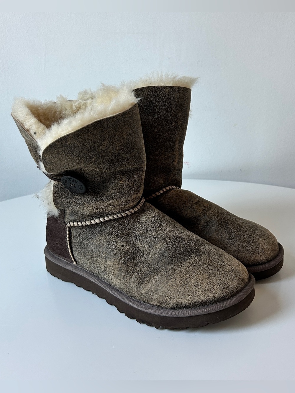 UGG Australia Bailey Button Bomber Shearling Boots in Distressed Brown